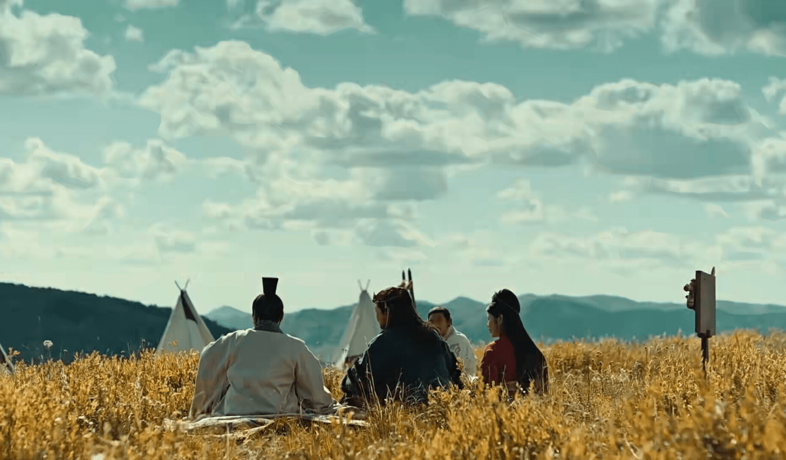 Depiction of a meeting between the Han and Xianbei groups in a field under a cloudy sky