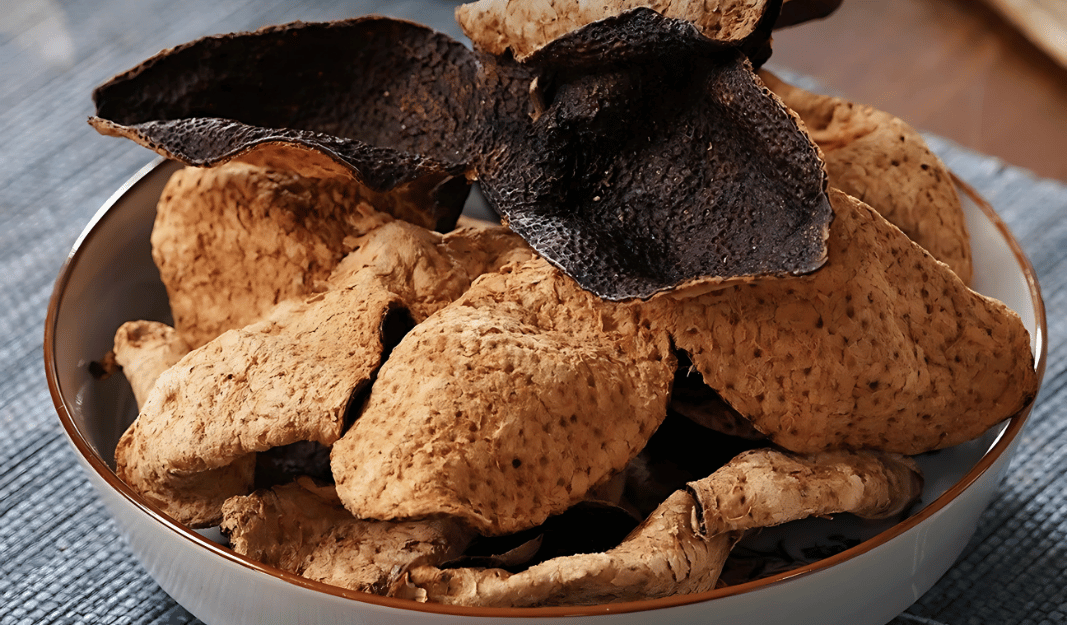 Close-up of Xinhui Chenpi, traditional aged dried tangerine peel from Xinhui, in the Wuyi region