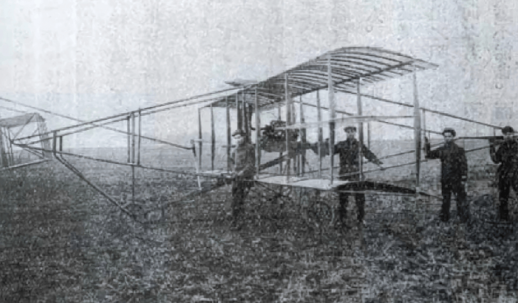 Historical image of Feng Ru, Enping aviation pioneer, with his early aircraft.