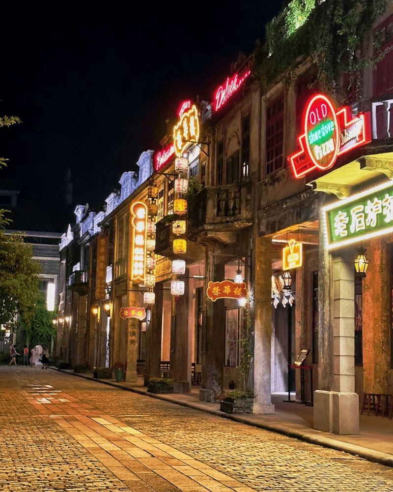 Night view of qilou buildings in Chikan Town, showcasing the vibrant lights and preserved architecture.