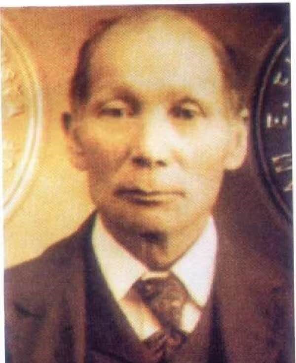 Portrait of Chen Yixi, the visionary leader behind the Sunning Railway, dressed in formal attire.